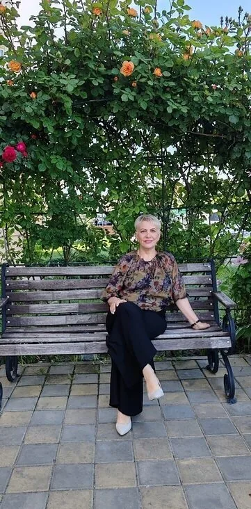 Мила